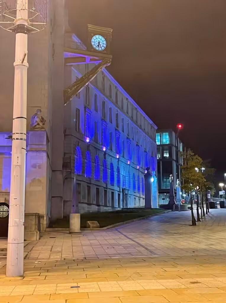 Building lit up purple