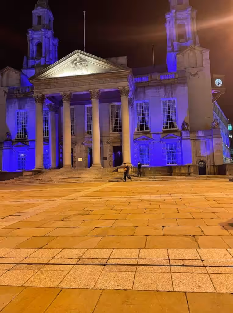 Building lit up purple