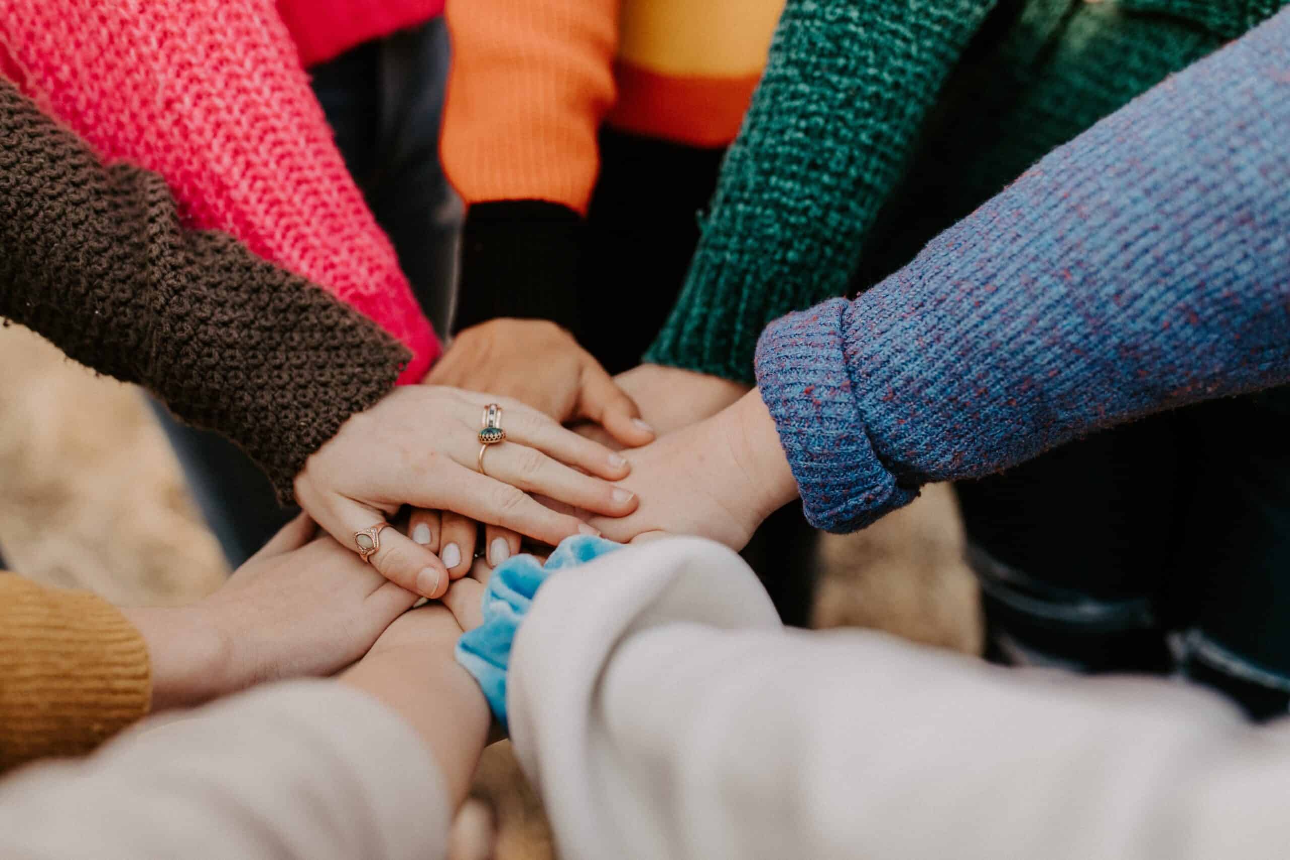 Hands together showing support