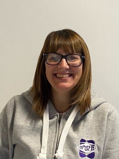 Photo of Sarah wearing her PoTS UK Hoody