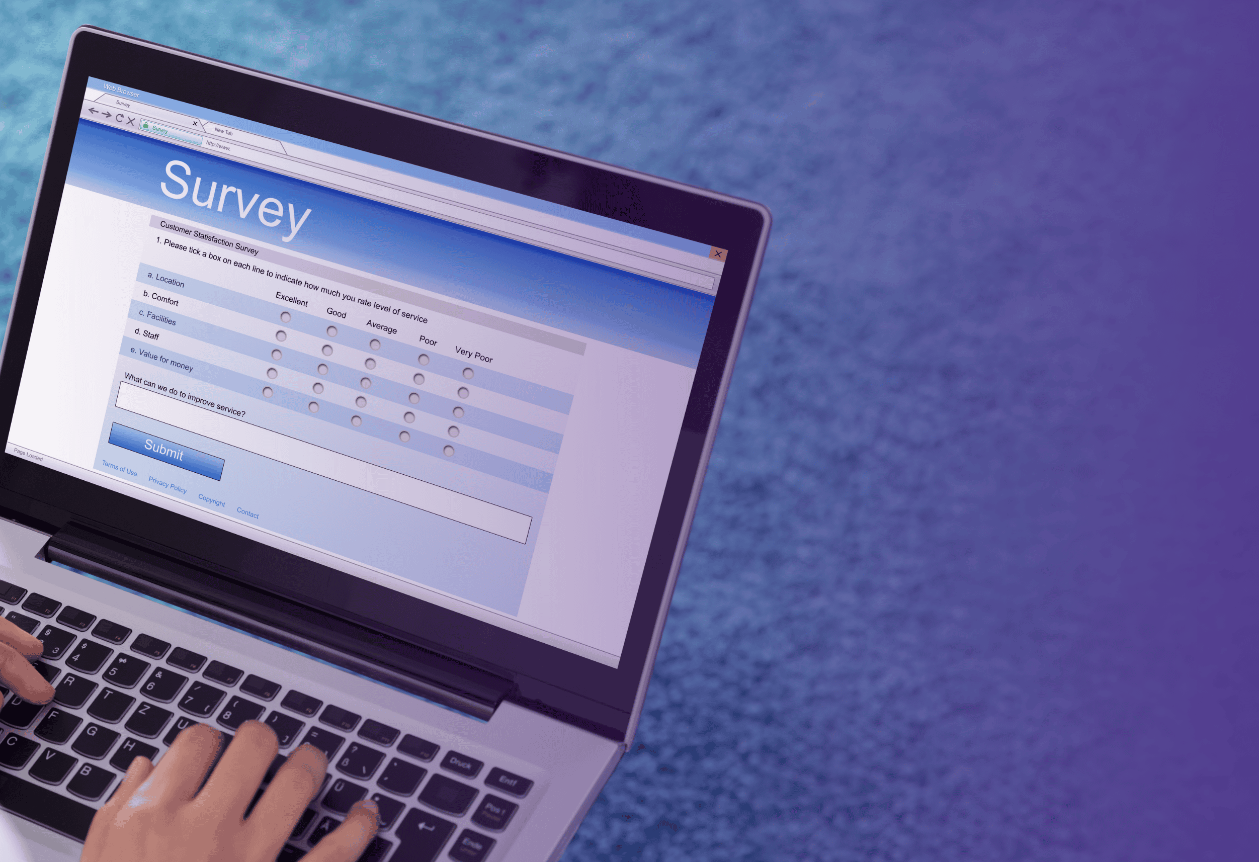 A laptop showing the word Survey