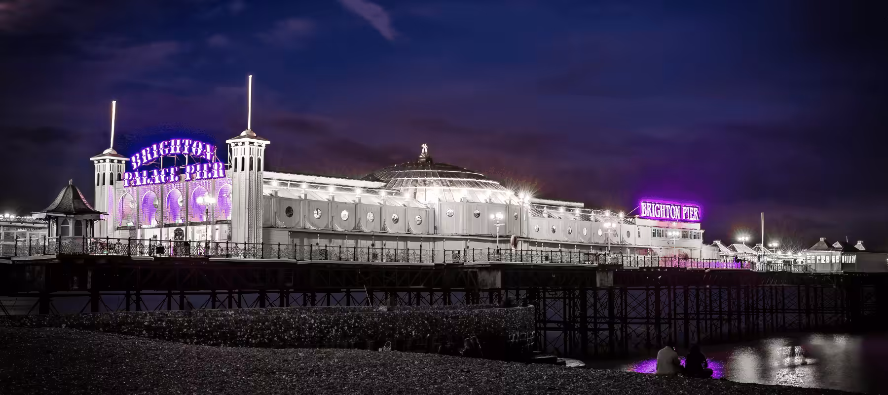 Brighton Pier lit up in purple