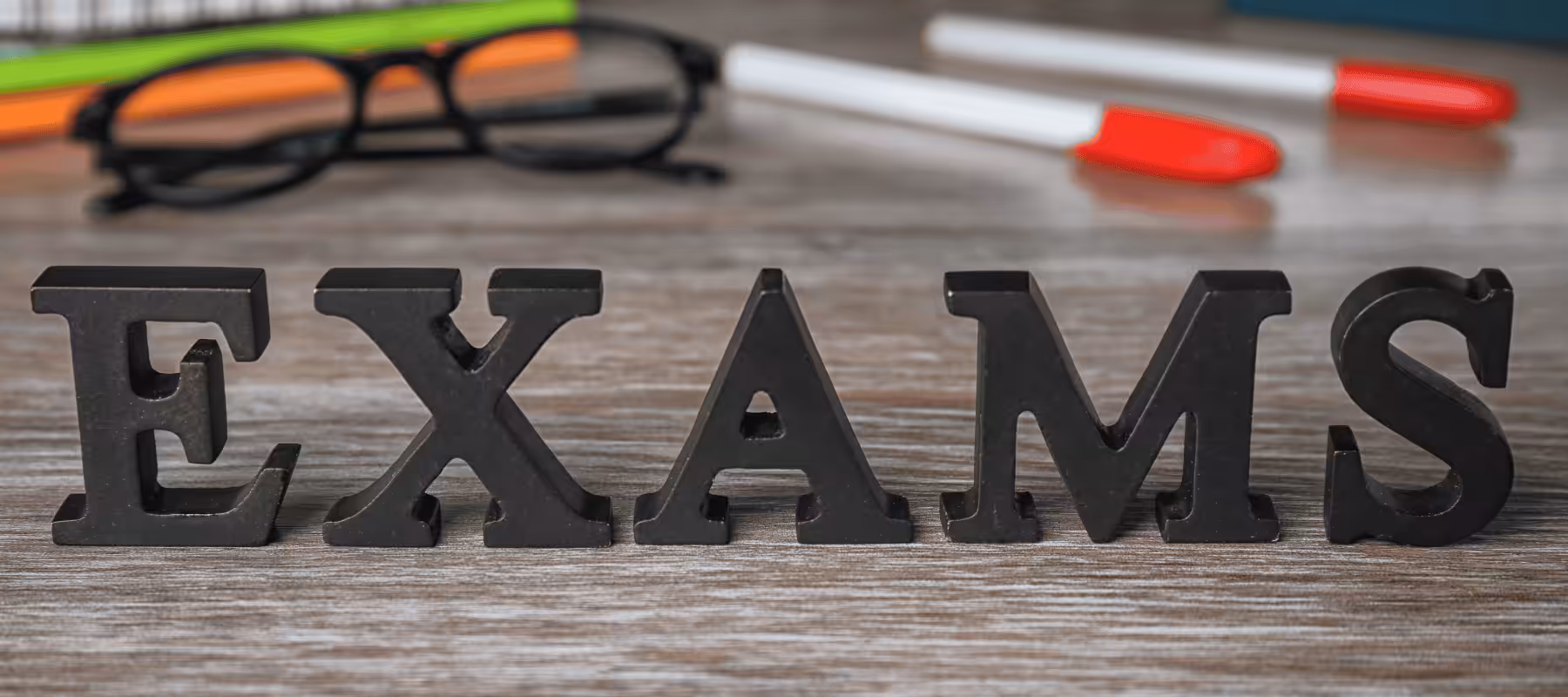 Wooden block spelling exams